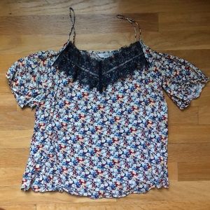 Printed “cold shoulder” short sleeve blouse